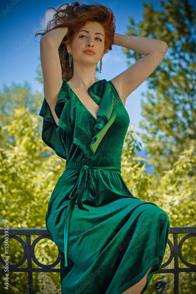 Gorgeous redhead woman with pale skin in green velvet dress in vintage  style Stock Photo | Adobe Stock