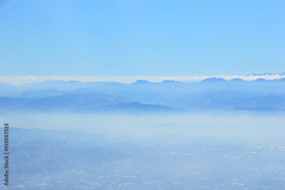 Obraz premium Blue mountain in the fog
