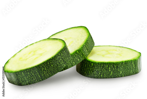 Fresh zucchini slices isolated on a white background.