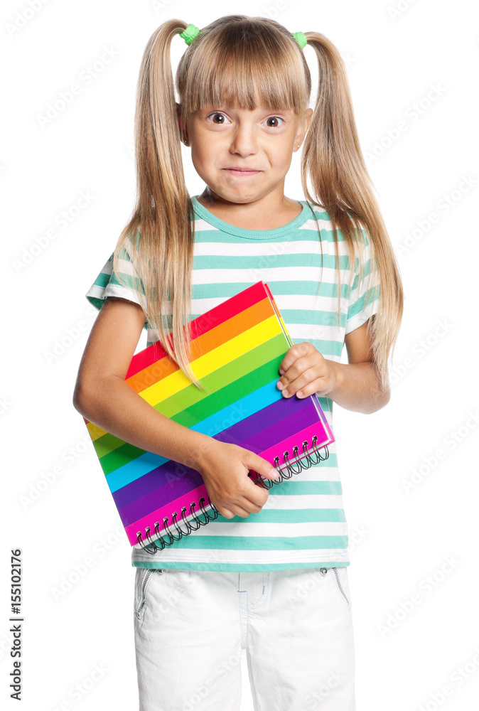 Little girl with exercise book, isolated on white background