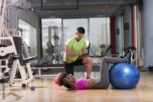 pilates workout with personal trainer at gym