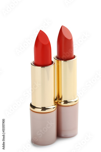 Red lipsticks isolated on a white