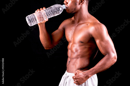 man big muscles with water bottle