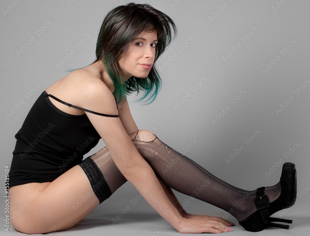 Seated Bottomless Woman in Top, Ripped 