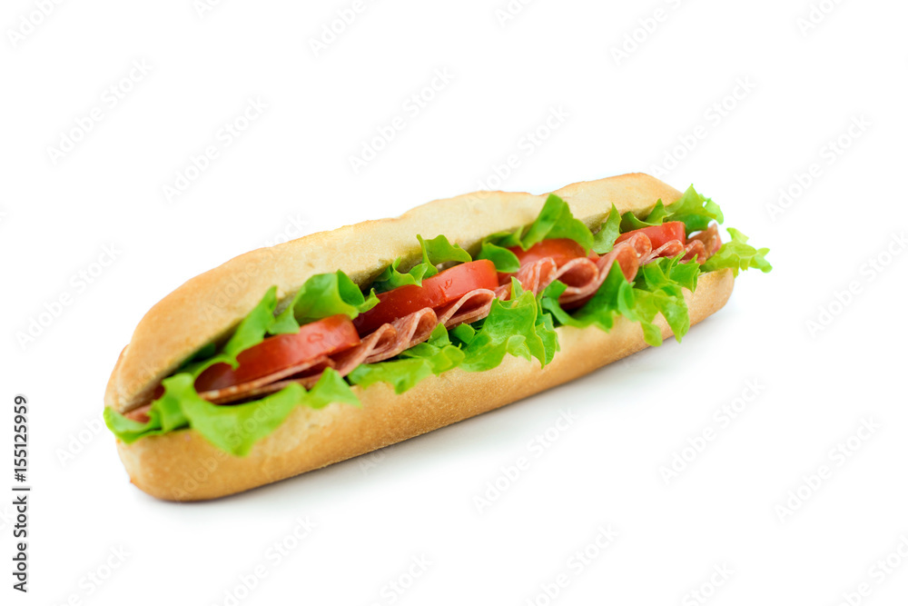 Fresh baguette sandwich with vegetables and salami isolated on white background Fresh baguette sandwich with vegetables and salami isolated on white background