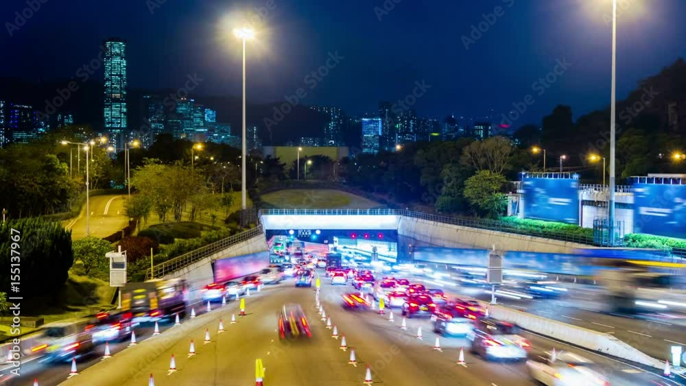 Busy Traffic Going Into Tunnel at Night. 4k Tight Still Shot. Hong Kong rush hour night timelapse. Busy cars entering the cross harbor tunnel. Busy Traffic Going Into Tunnel at Night. 4k Tight Still Shot. Hong Kong rush hour night timelapse. Busy cars entering the cross harbor tunnel.