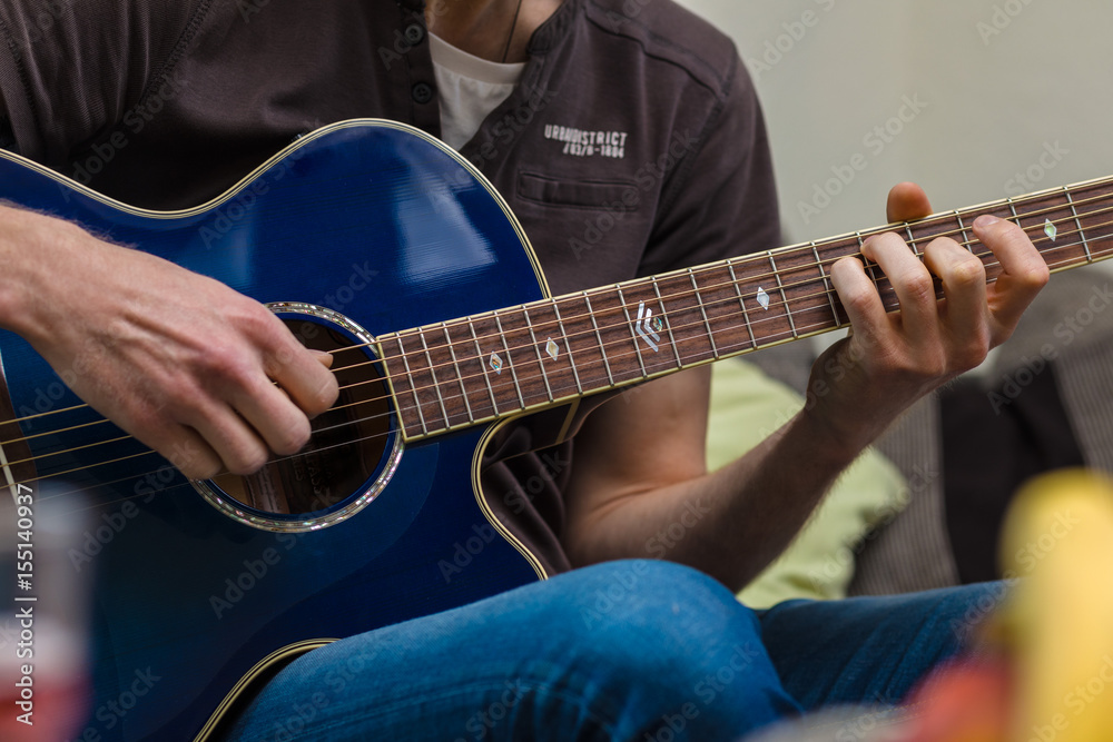 Obraz premium Student Plays Guitar