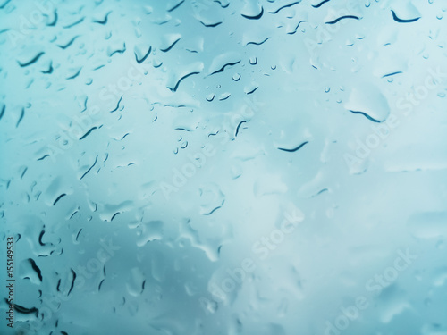 Water rain drops on glass bokeh background