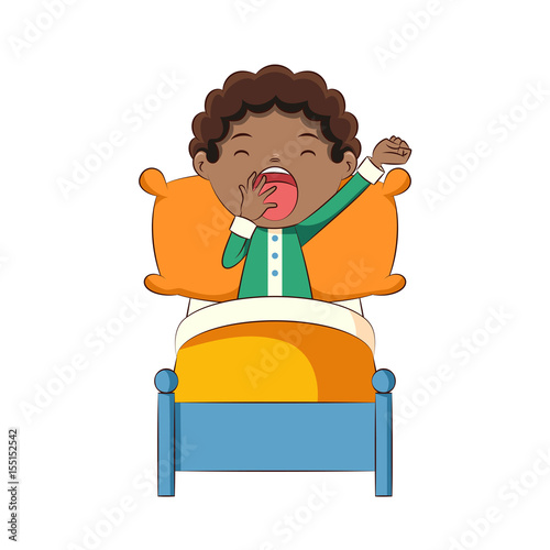 Boy yawning in bed