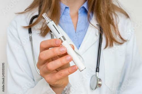 Doctor offers an electronic cigarette or vaporizer