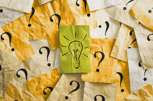 an idea in the middle of question marks photo