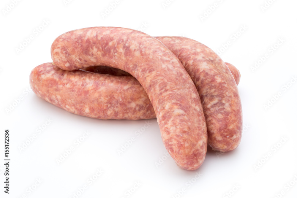 Raw sausage with parsley leaf isolated on white background.