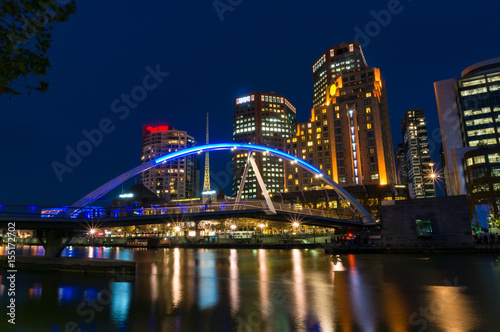 Melbourne river view with pedestrian bridge at night