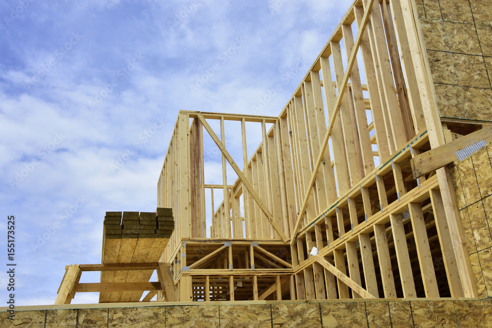 Obraz premium Wood frame homes under construction.