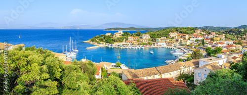 Panorama of Kassiopi, town in Corfu, Greece photo