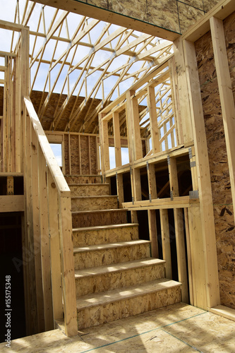 Wood frame homes under construction.