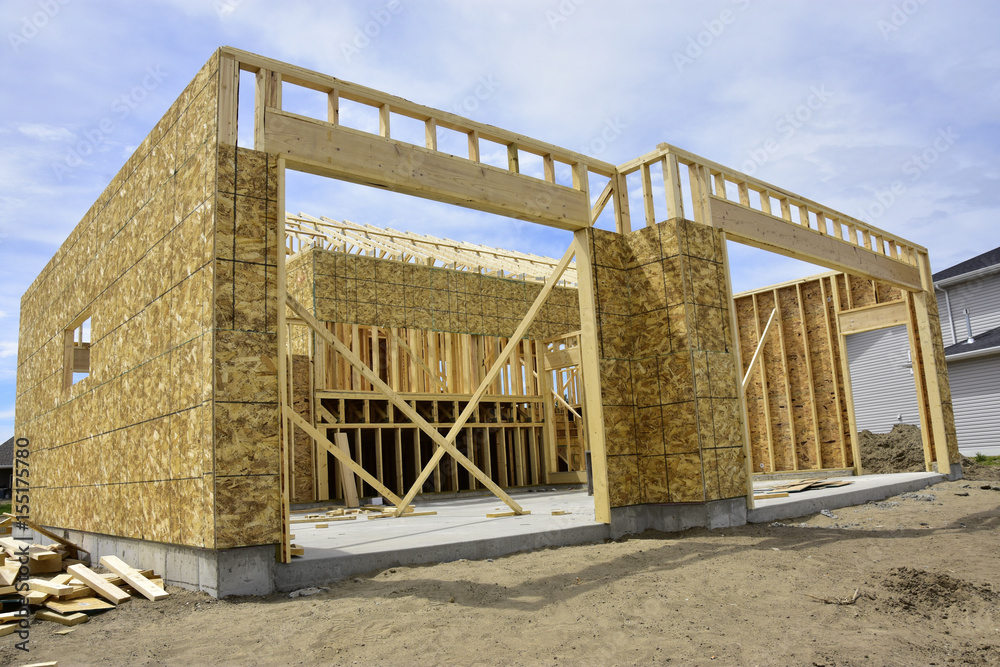 Obraz premium Wood frame homes under construction.
