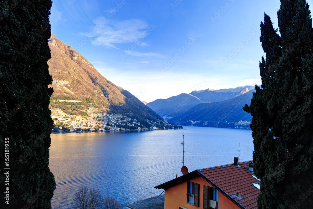 Lake Como. Mountains in the rays of the morning sun
