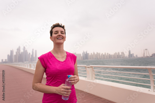 young woman celebrating a successful training run