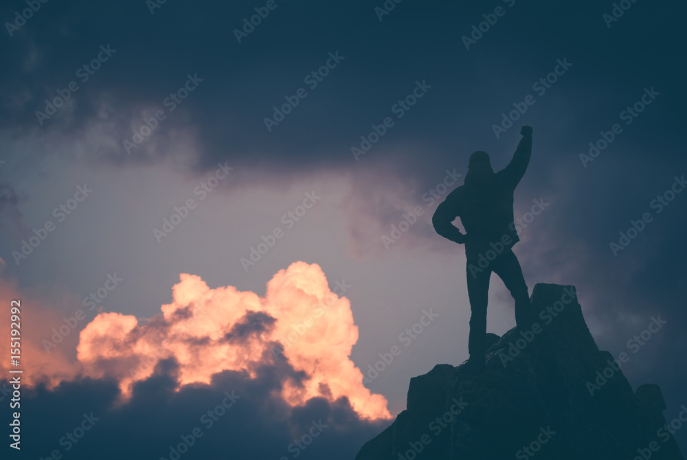 Hiker against sunset sky. Instagram stylisation