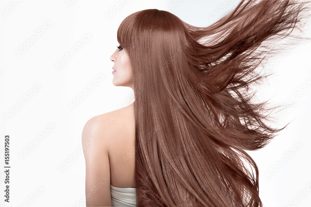 Naklejka premium Beauty model with a gorgeous long hair. Flying hair