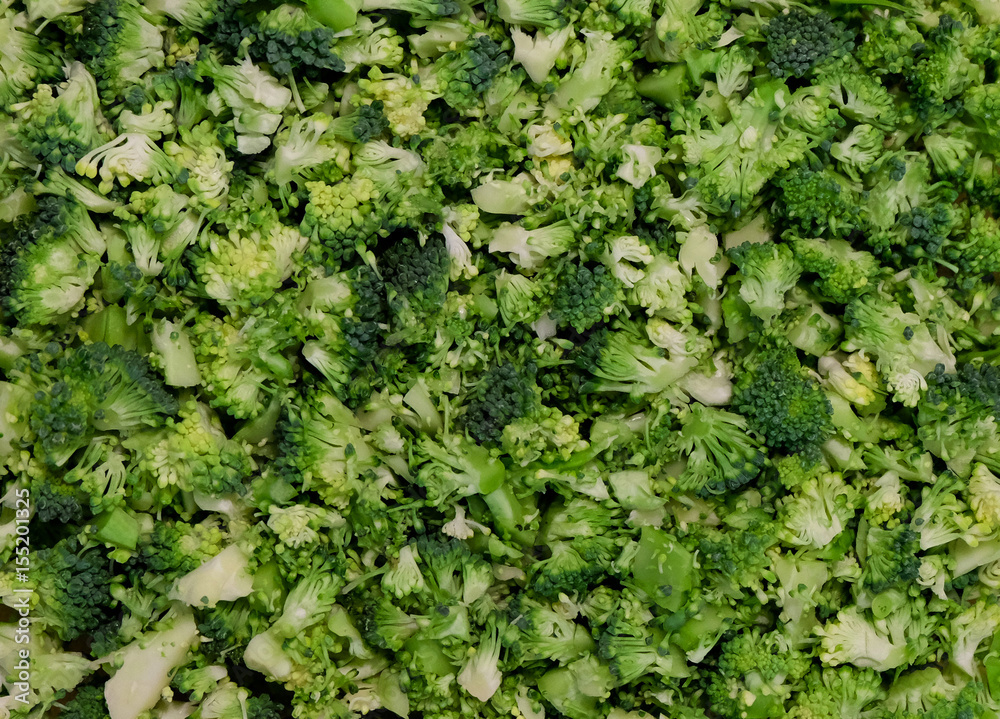food background pattern - fresh raw sliced broccoli, prepared for cooking - bio healthy green food concept