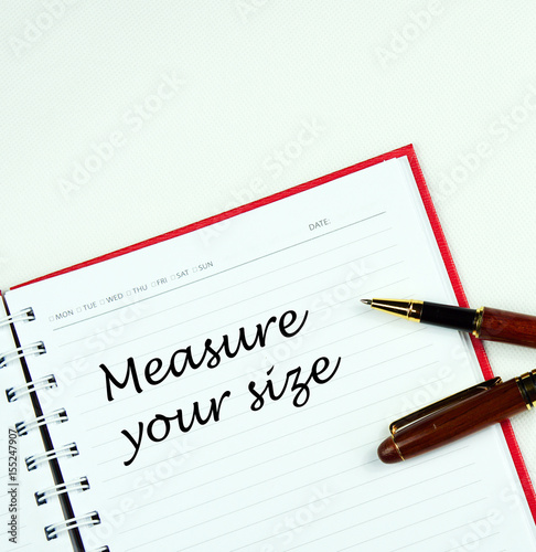 Wallpaper Mural Communication message motivation concept with " measure your size " word on notebook. Torontodigital.ca