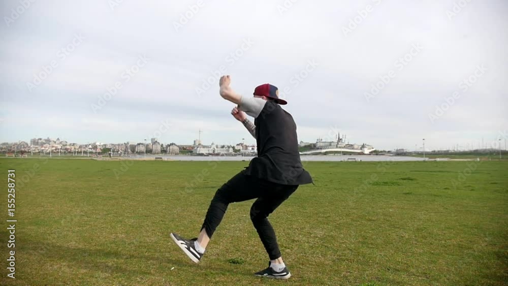 Back flip somersault in slow motion by teenager male Back flip somersault in slow motion by teenager male