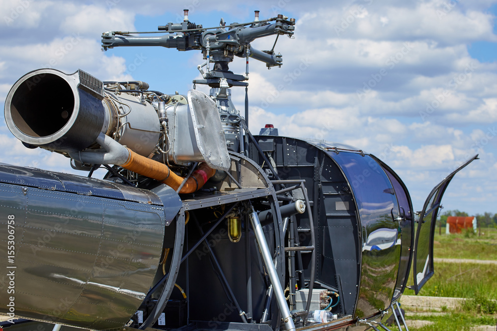 A jet helicopter with a trim on the engine.