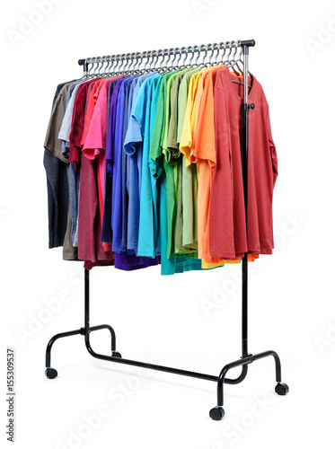 Mobile rack with color clothes on white background. File contains a path to isolation. 