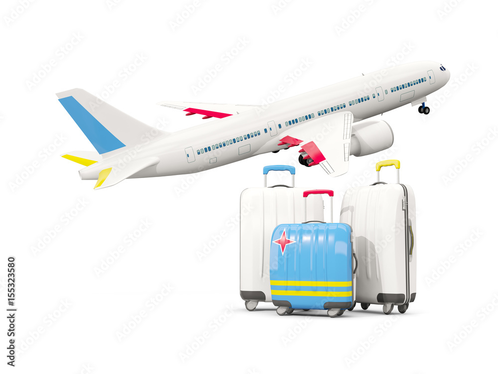 Luggage with flag of aruba. Three bags with airplane