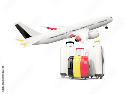Luggage with flag of belgium. Three bags with airplane © Mikhail Mishchenko