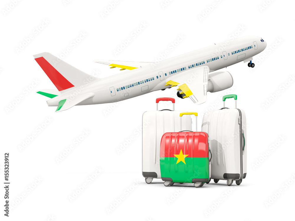 Luggage with flag of burkina faso. Three bags with airplane