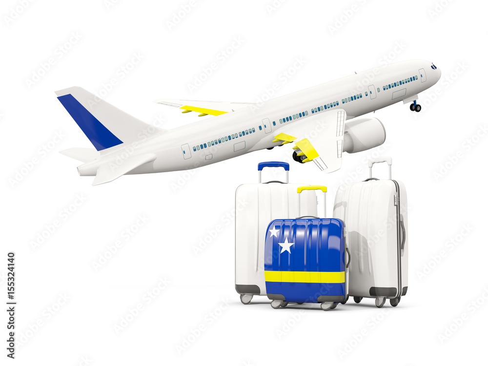 Luggage with flag of curacao. Three bags with airplane