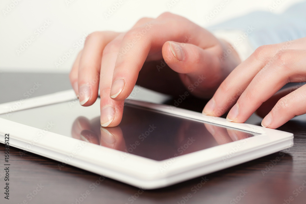Woman using tablet computer Woman using tablet computer