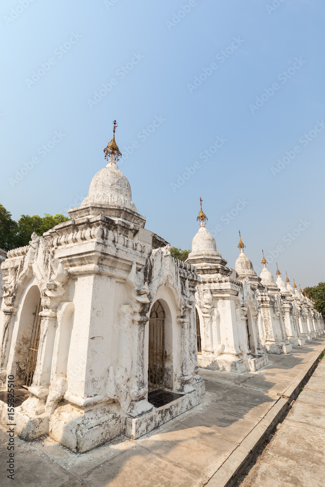 Some of the 729 stupas known as the world's largest book at the Kuthodaw Pagoda in Mandalay, Myanmar (Burma). Copy space.