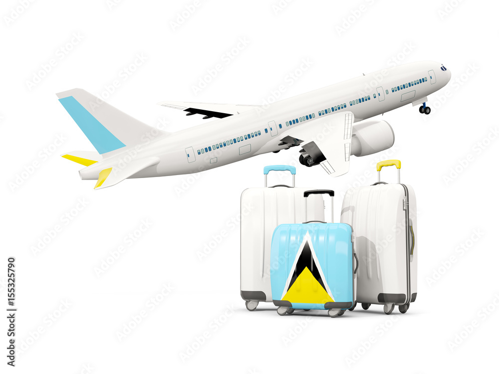 Luggage with flag of saint lucia. Three bags with airplane Luggage with flag of saint lucia. Three bags with airplane