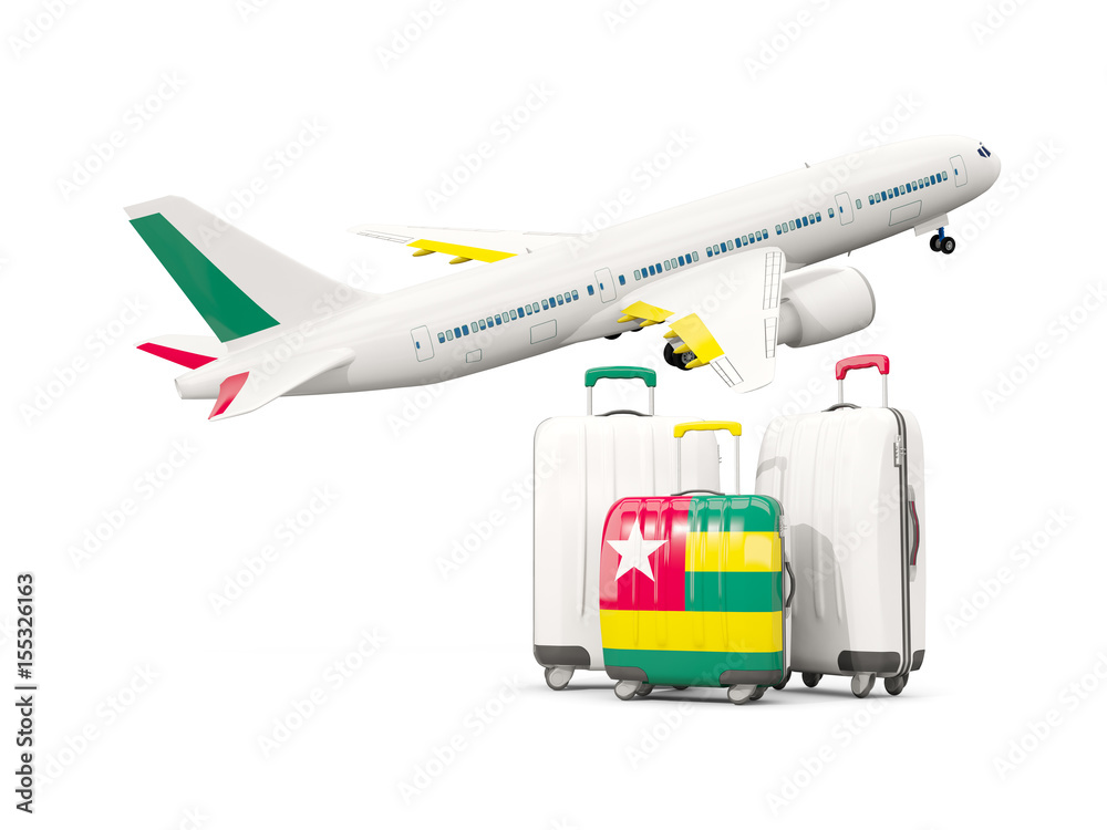 Luggage with flag of togo. Three bags with airplane