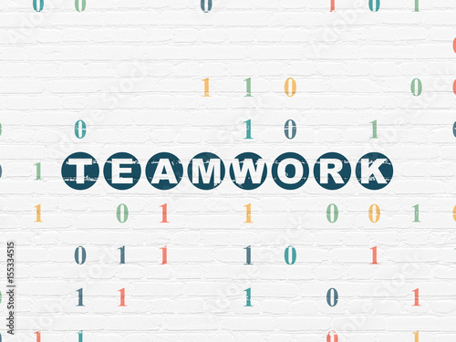 Finance concept: Teamwork on wall background
