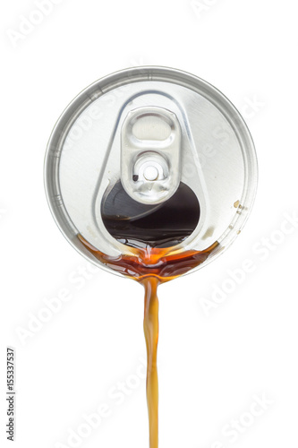 Top view of cola beverage flowing from the aluminum beverage can on white background.