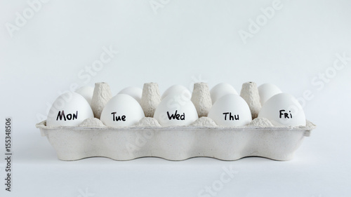 Monday to Friday written on eggs.