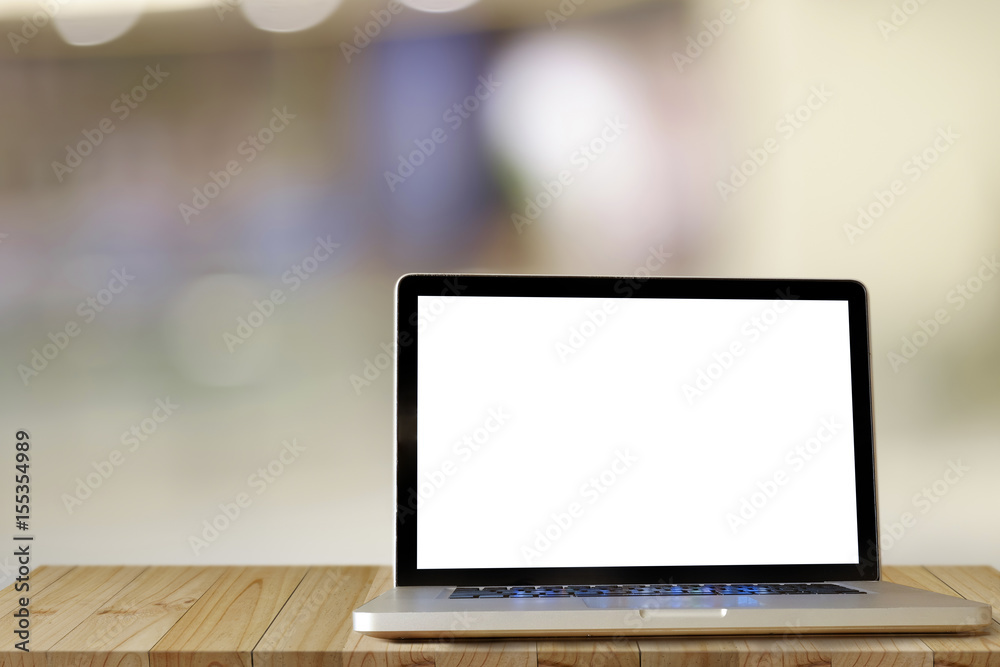 Laptop showing blank screen computer on wood table. Copy space for product or graphic montage. Laptop showing blank screen computer on wood table. Copy space for product or graphic montage.