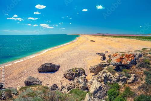 Panoramic view of Pink lake and the sea. Deserted beach photo