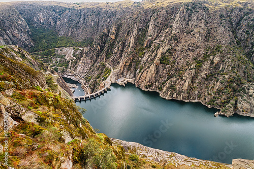 Aldeadavila Dam is a concrete arch-gravity dam on the Douro River on the border between Spain and Portugal. photo