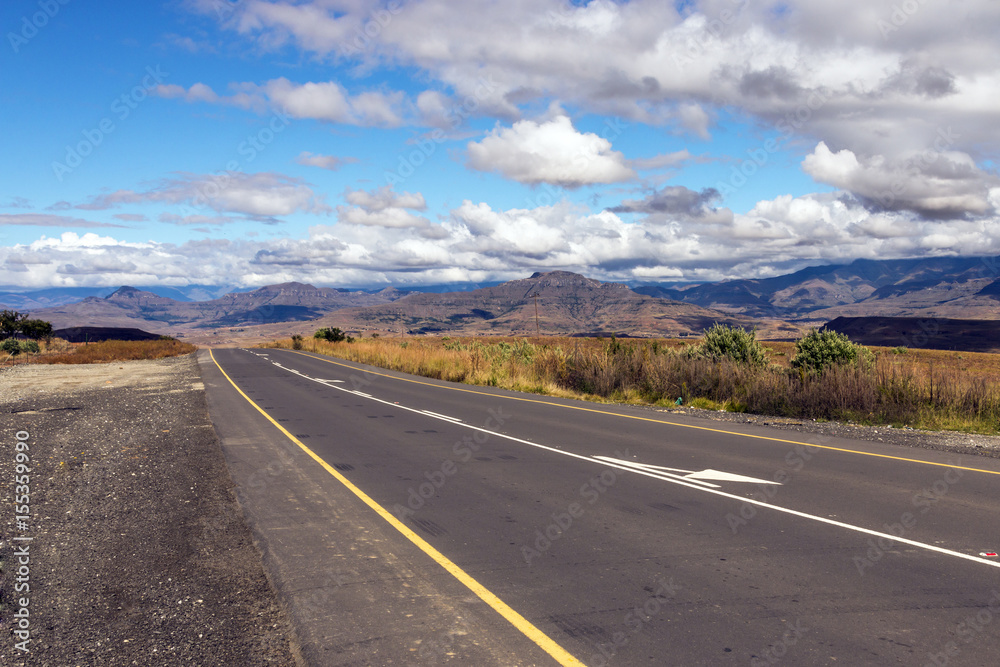 Asphalt Road Running Through Dry Orange Winter Mountain Landscape Asphalt Road Running Through Dry Orange Winter Mountain Landscape