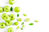 natural food design with green apples and leaves white desk background top view mock up