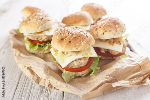 Deluxe gourmet burger on wooden table