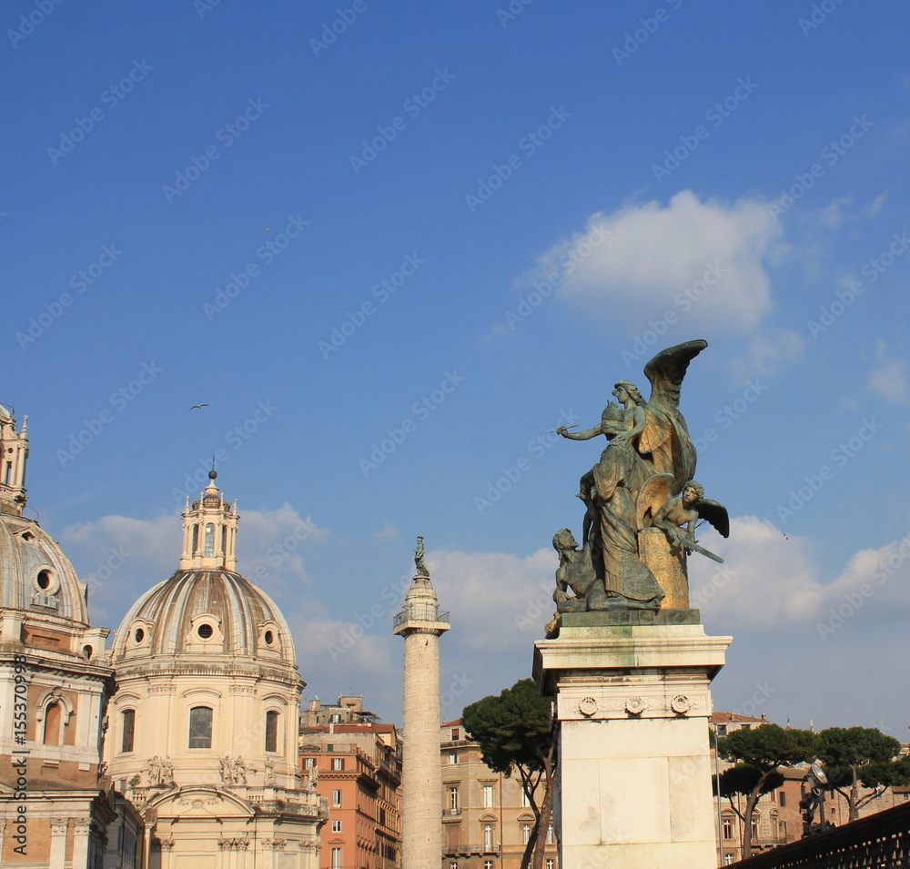 Obraz premium Santa Maria di Loreto church and statue in front of National Monument of Victor Emmanuel II, Rome, Italy