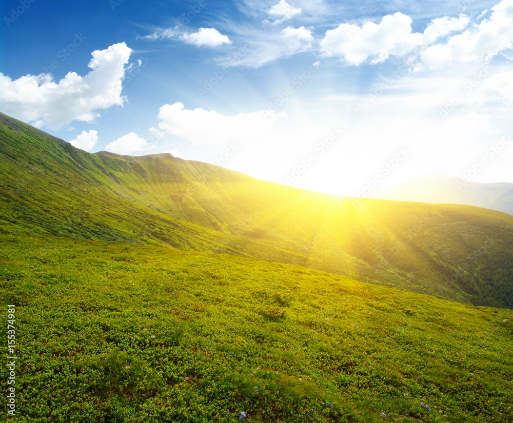 Mountain landscape on sun