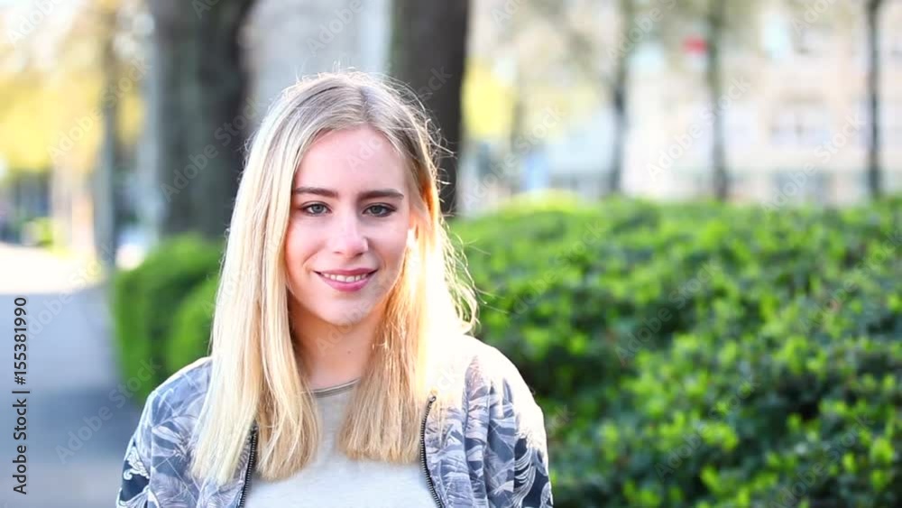 Beautiful blonde girl portrait outdoors